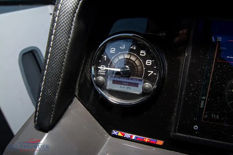 Slide: The Image of 2023 Monterey M6 boat dashboard with RPM gauge and digital display. - 37