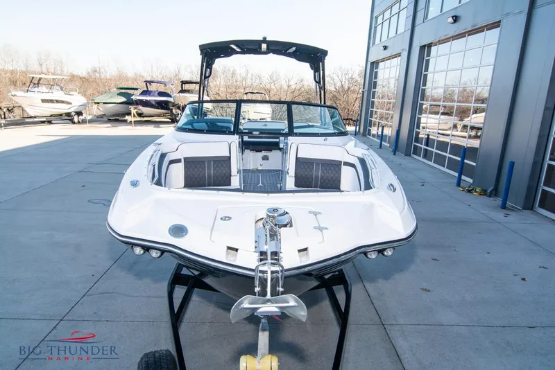 Slide: The Image of 2023 Monterey M6 boat on trailer at Big Thunder Marine dealership. - 4