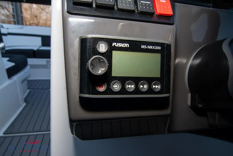 Slide: The Image of Fusion MS-NRX300 marine stereo control on 2023 Monterey M6 boat dashboard. - 41