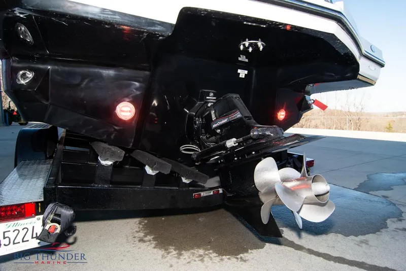 Slide: The Image of 2023 Monterey M6 boat stern with propeller and trailer. - 8