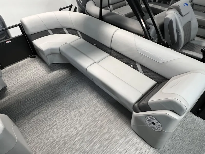 Slide: The Image of 2023 Bennington 22SXSRC boat interior with sleek gray seating and modern design. - 13