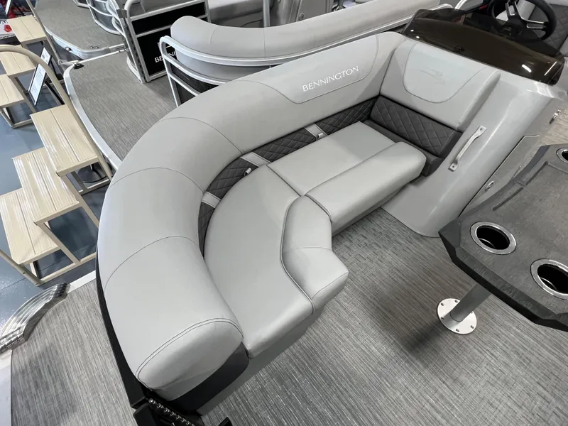 Slide: The Image of 2023 Bennington 22SXSRC boat interior with gray seating and modern design. - 7
