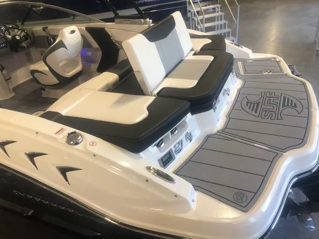 Slide: The Image of 2023 Chaparral 21 Surf boat interior with sleek seating and modern design. - 3
