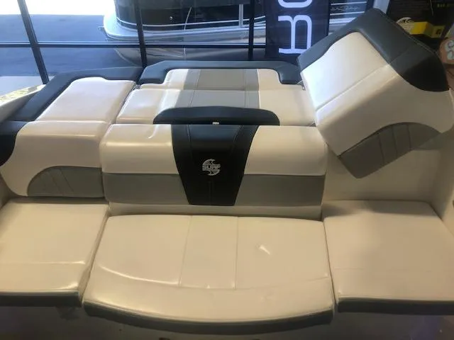 Slide: The Image of 2023 Chaparral 21 Surf boat interior seating, featuring modern design and comfortable upholstery. - 6