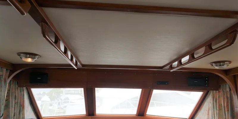 Slide: The Image of Interior ceiling of 1987 Jefferson 42 Sundeck Motor Yacht with wooden accents. - 15
