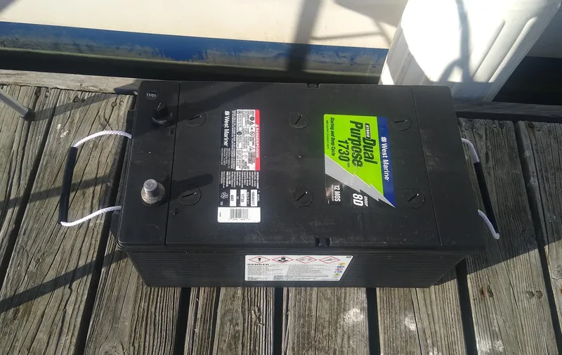 Slide: The Image of Battery on dock near 1987 Jefferson 42 Sundeck Motor Yacht. - 25