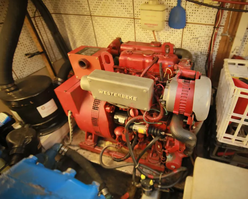 Slide: The Image of 1987 Jefferson 42 Sundeck Motor Yacht engine room with Westerbeke generator. - 28