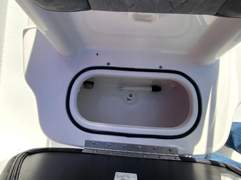 Slide: The Image of Open storage compartment in 2023 Avid 21 Mag boat. - 14