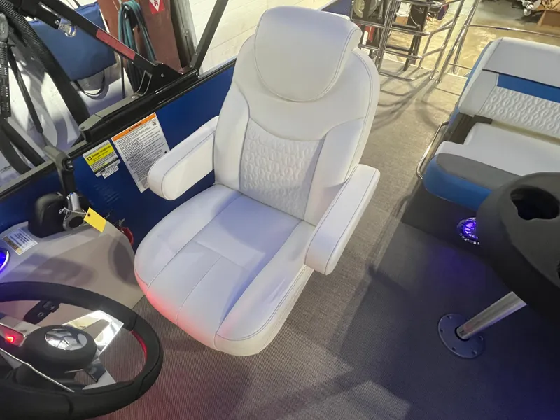 Slide: The Image of Captain's chair in 2023 Godfrey SWEETWATER 2286 SFL pontoon boat interior. - 5