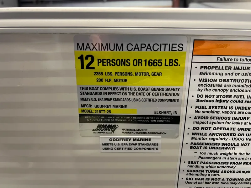 Slide: The Image of Capacity label for 2023 Godfrey Monaco MC215C, 12 persons or 1665 lbs, 200 HP motor. - 10