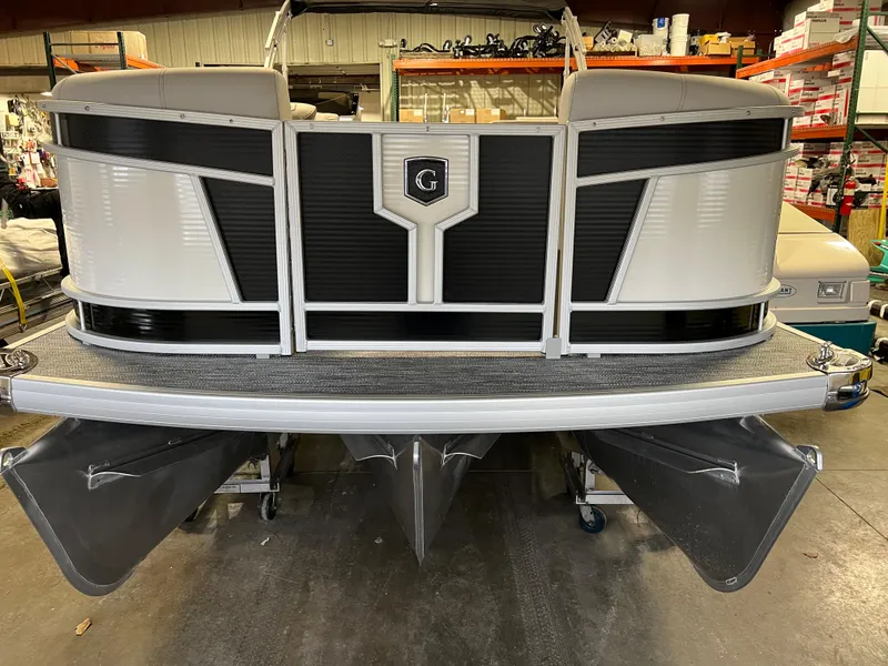 Slide: The Image of 2023 Godfrey Monaco MC215C pontoon boat in a warehouse setting. - 3