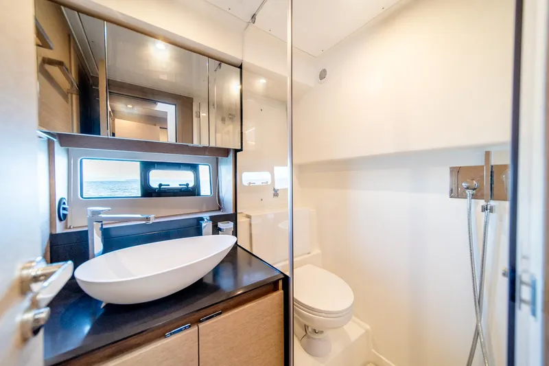 Slide: The Image of Modern bathroom in 2024 Prestige 460 yacht with sleek fixtures and ocean view. - 16