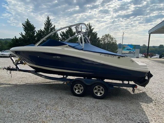 Slide: The Image of 2008 Sea Ray 230 Select Fission boat on a trailer, side view. - 5