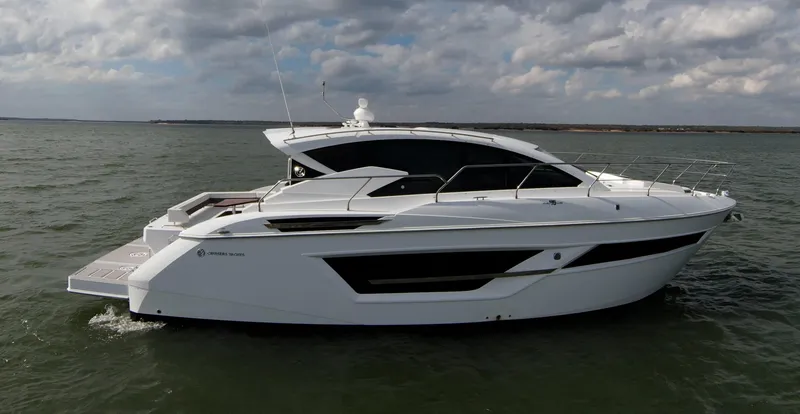 Slide: The Image of 2020 Cruisers Yachts 460 Cantius luxury motor yacht on open water. - 12