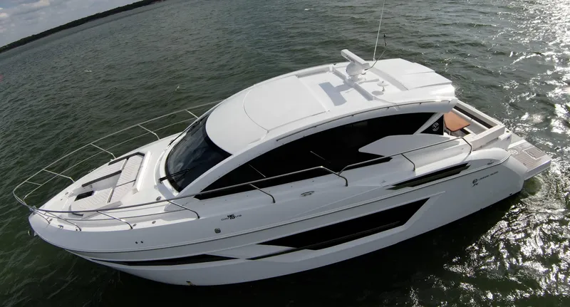 Slide: The Image of 2020 Cruisers Yachts 460 Cantius luxury boat on water. - 13