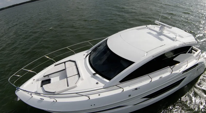 Slide: The Image of 2020 Cruisers Yachts 460 Cantius luxury motor yacht on open water. - 22