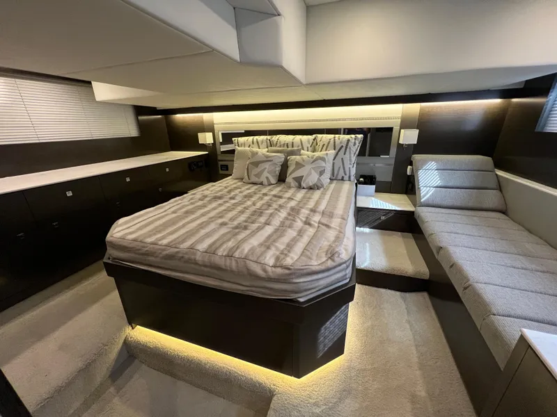 Slide: The Image of Luxurious bedroom interior of 2020 Cruisers Yachts 460 Cantius with modern design and ambient lighting. - 39