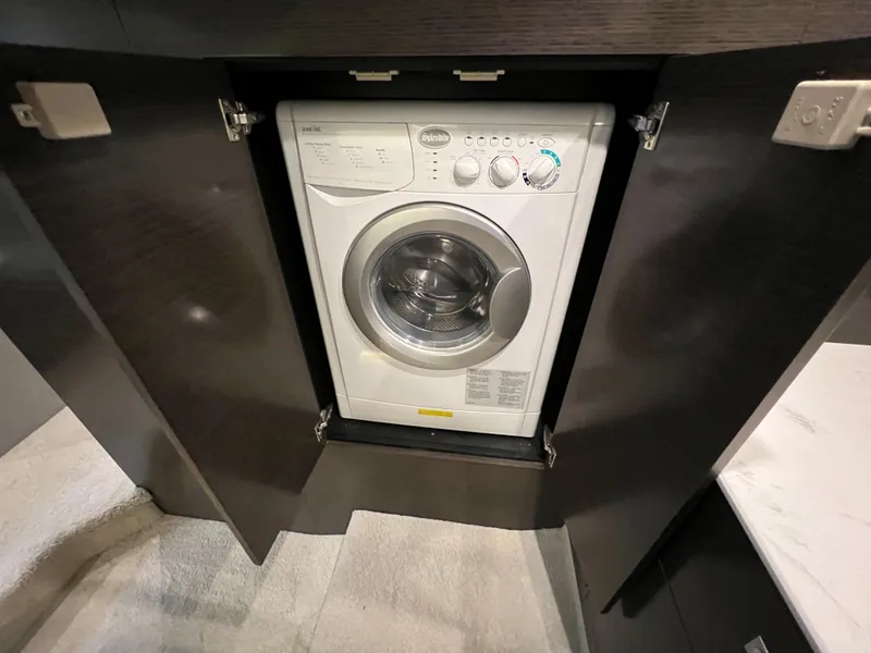 Slide: The Image of Built-in washing machine in 2020 Cruisers Yachts 460 Cantius. - 43
