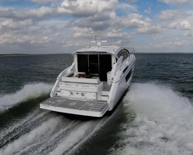 Slide: The Image of 2020 Cruisers Yachts 460 Cantius cruising on open water. - 5