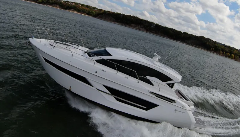 Slide: The Image of 2020 Cruisers Yachts 460 Cantius cruising on open water. - 6