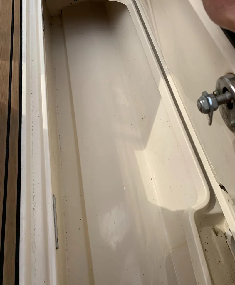 Slide: The Image of 2018 Scout 350 LXF boat compartment interior with latch detail. - 26