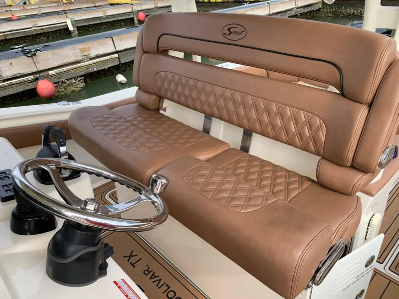 Slide: The Image of Luxurious leather seating on 2018 Scout 350 LXF boat, featuring elegant diamond stitching. - 49
