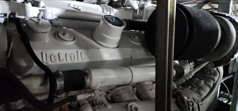 Slide: The Image of 1978 Hatteras Sportfish engine, featuring a Detroit Diesel component. - 31