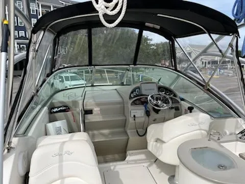 Slide: The Image of 2005 Sea Ray 270 Amberjack boat interior with helm and seating. - 12
