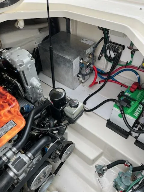 Slide: The Image of Engine compartment of a 2005 Sea Ray 270 Amberjack boat. - 19