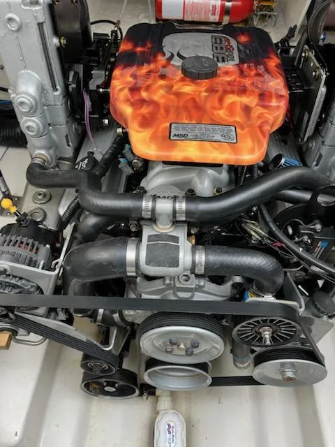 Slide: The Image of 2005 Sea Ray 270 Amberjack engine with custom flame-painted cover. - 21