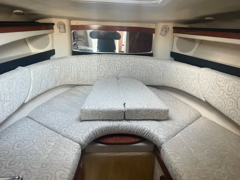Slide: The Image of Interior cabin of 2005 Sea Ray 270 Amberjack with cushioned seating. - 32