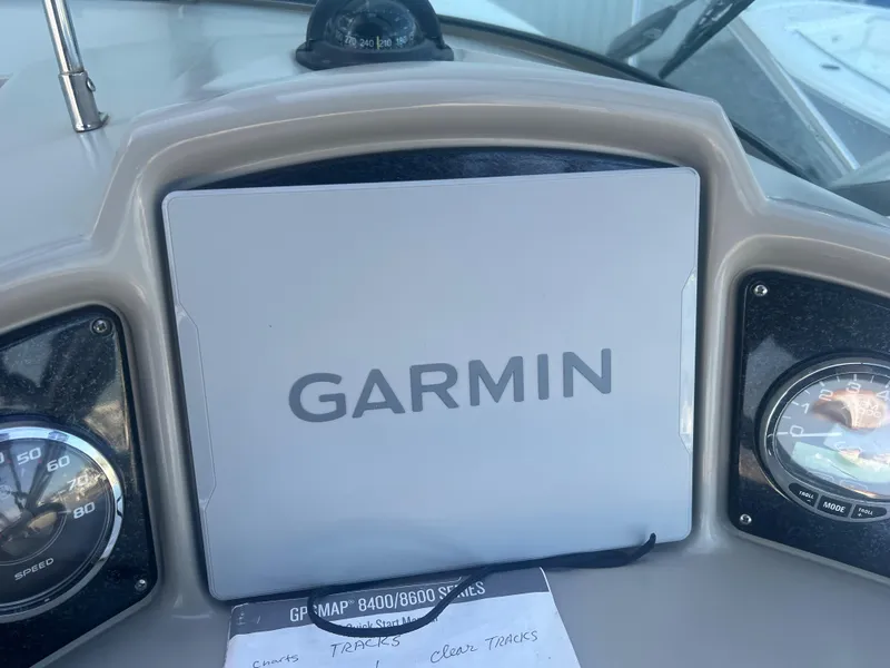 Slide: The Image of Garmin navigation system on 2005 Sea Ray 270 Amberjack boat dashboard. - 36