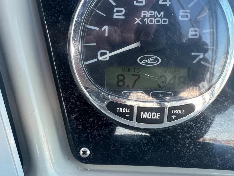 Slide: The Image of Close-up of 2005 Sea Ray 270 Amberjack RPM gauge showing 8.7 volts and 949 hours. - 38