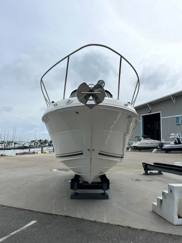 Slide: The Image of 2005 Sea Ray 270 Amberjack boat on dry dock at marina. - 4