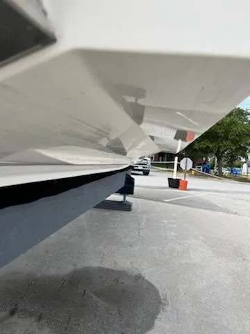 Slide: The Image of 2005 Sea Ray 270 Amberjack boat hull on trailer, side view. - 6