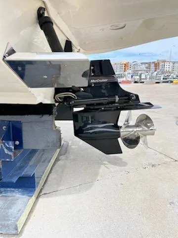 Slide: The Image of 2005 Sea Ray 270 Amberjack boat outdrive and propeller on dry dock. - 7