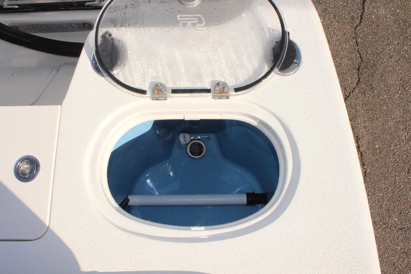 Slide: The Image of 2023 Sea Chaser 27 HFC boat livewell with open lid. - 14