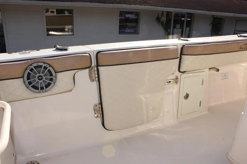 Slide: The Image of 2023 Sea Chaser 27 HFC boat interior with speaker and storage compartments. - 16