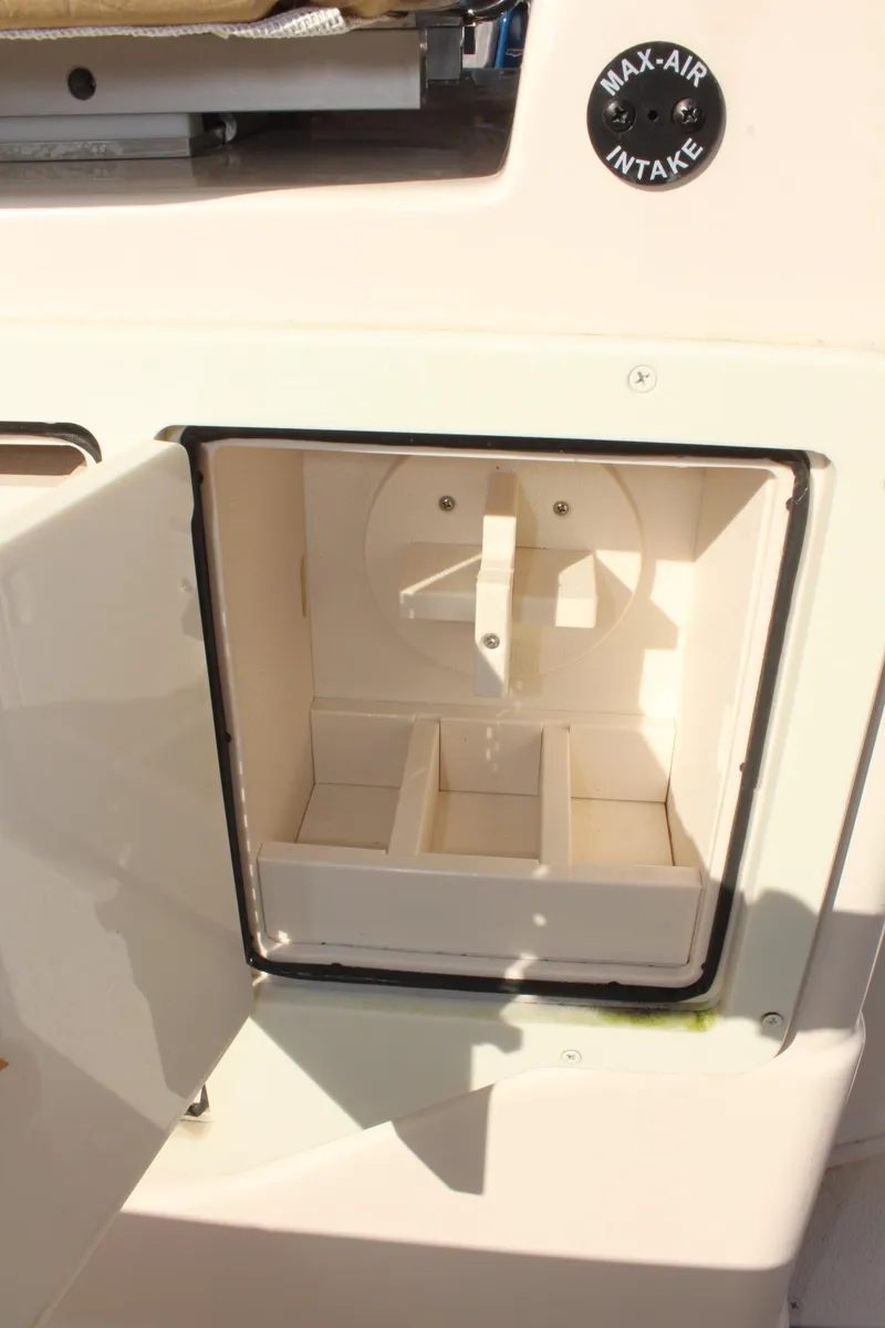Slide: The Image of 2023 Sea Chaser 27 HFC boat compartment with Max-Air intake feature. - 18