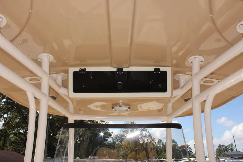Slide: The Image of 2023 Sea Chaser 27 HFC boat canopy and console detail. - 23