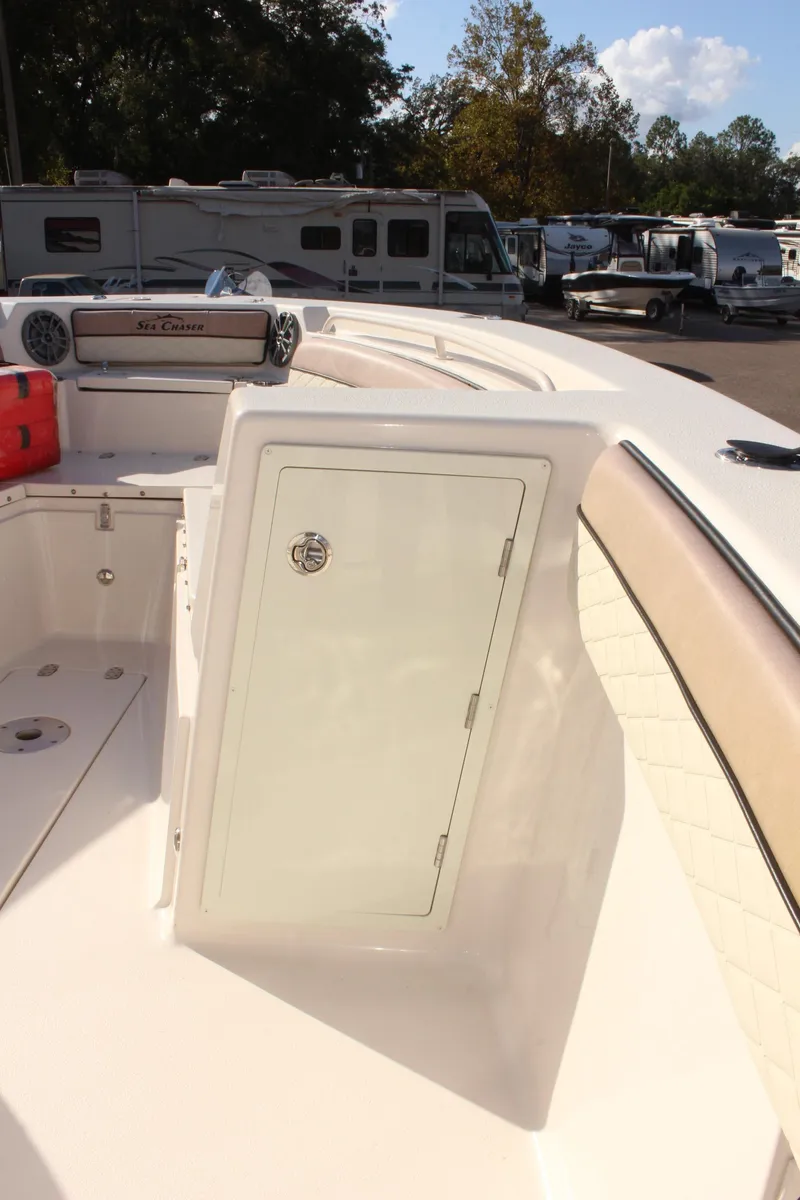Slide: The Image of 2023 Sea Chaser 27 HFC boat interior with storage compartment. - 28