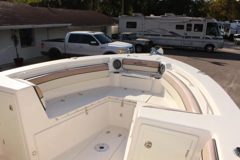 Slide: The Image of 2023 Sea Chaser 27 HFC boat interior with seating and storage. - 30