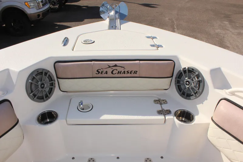 Slide: The Image of 2023 Sea Chaser 27 HFC boat interior with speakers and seating. - 37