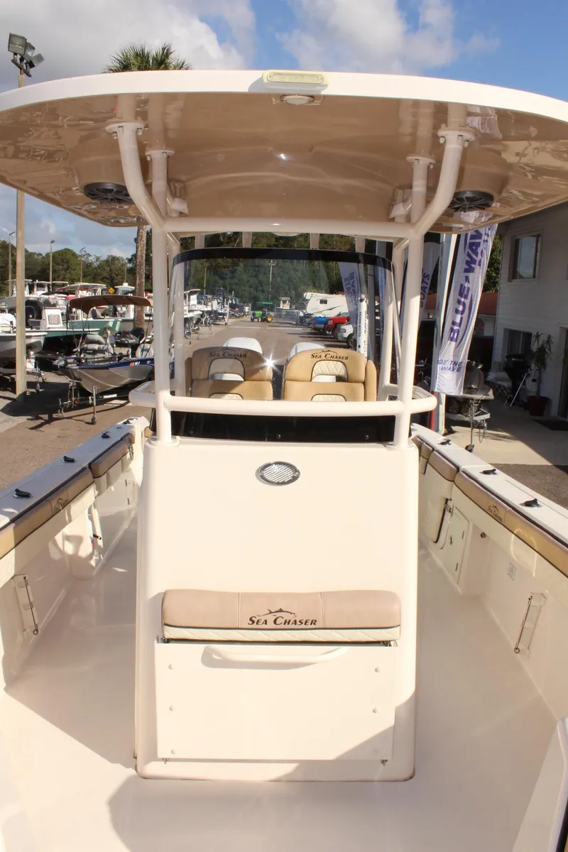 Slide: The Image of 2023 Sea Chaser 27 HFC boat, center console view, outdoor display. - 40