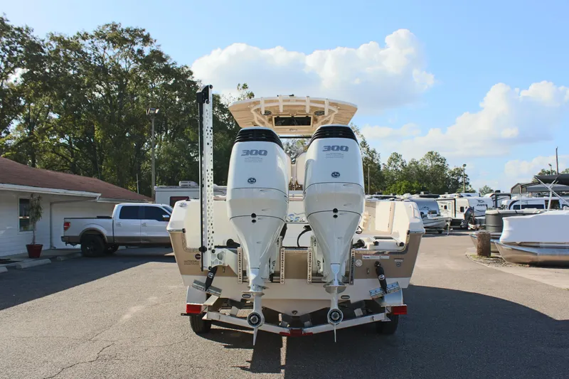 Slide: The Image of 2023 Sea Chaser 27 HFC boat with dual 300 horsepower engines on a trailer. - 8