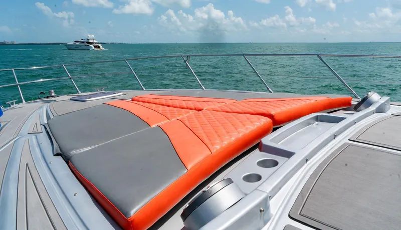 Slide: The Image of Luxurious 2013 Azimut Atlantis 58 yacht with vibrant sunbathing cushions on deck. - 17