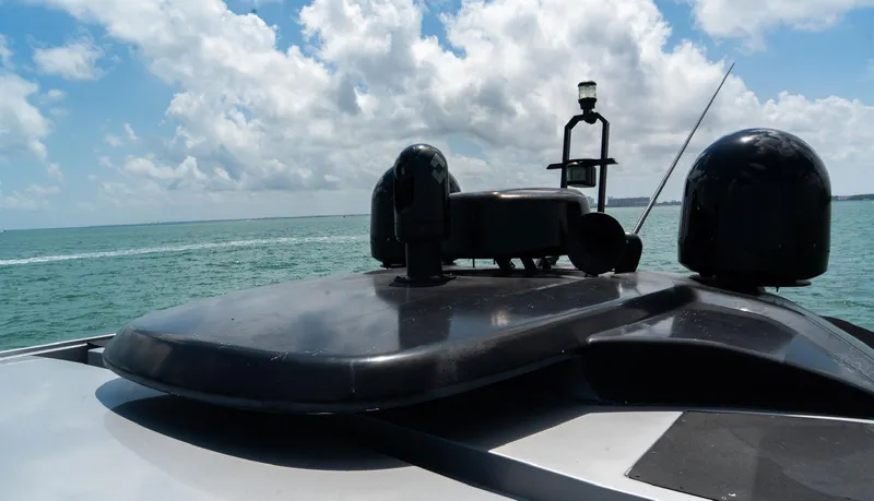 Slide: The Image of Azimut Atlantis 58 yacht roof view, 2013 model, against a scenic ocean backdrop. - 20