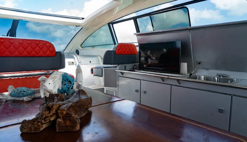 Slide: The Image of Luxurious interior of 2013 Azimut Atlantis 58 yacht with modern furnishings and panoramic windows. - 25