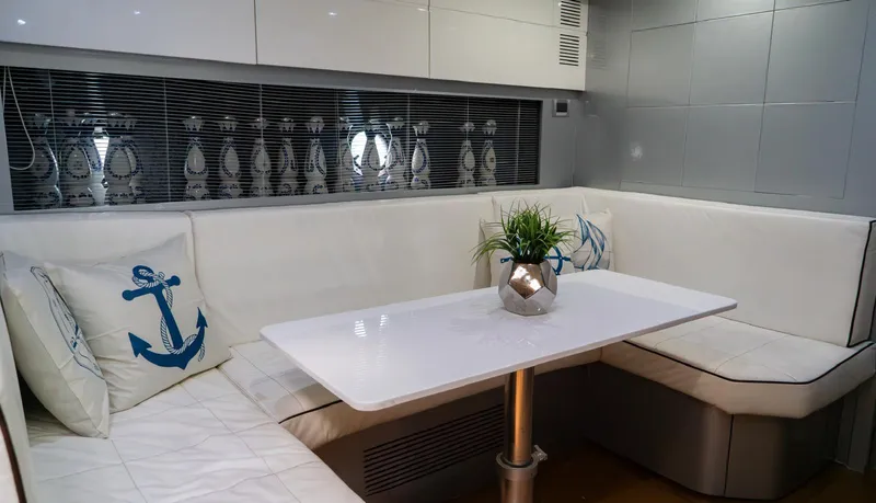 Slide: The Image of Luxurious interior of 2013 Azimut Atlantis 58 yacht with elegant seating and nautical decor. - 38