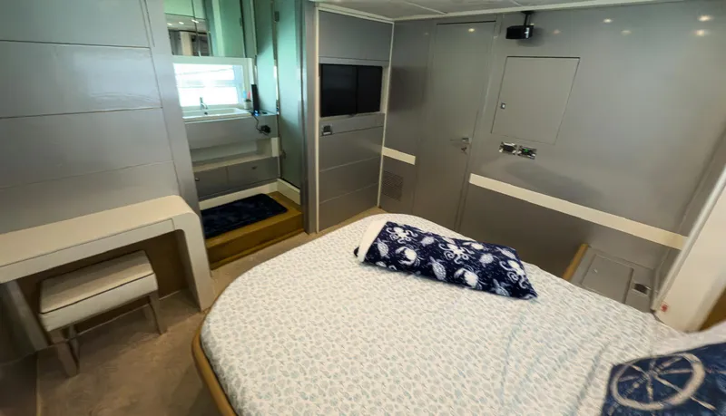 Slide: The Image of Luxurious bedroom interior of 2013 Azimut Atlantis 58 yacht with modern design and amenities. - 46